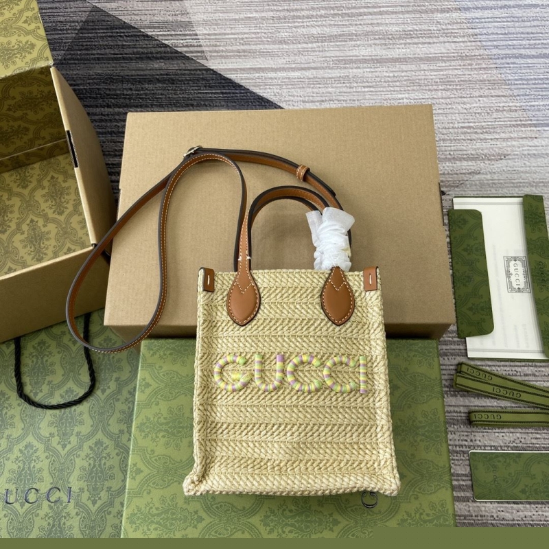 G*u*i top handle bags